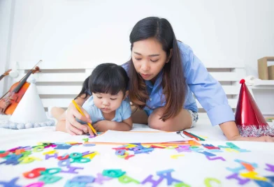 mother-daughter-studying-alphabet_11zon